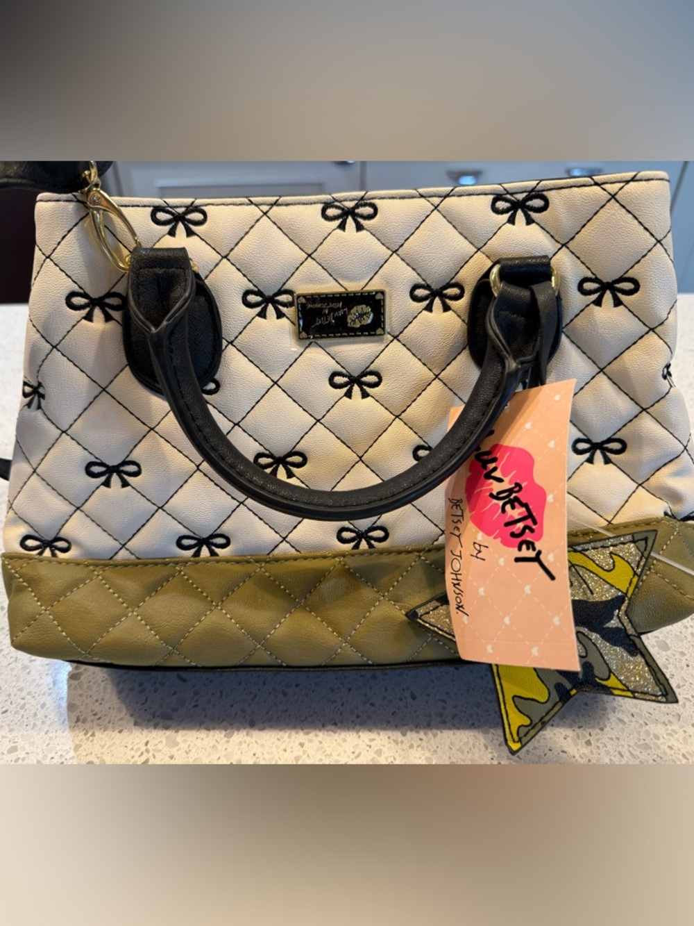 Betsey Johnson White Quilted Satchel with Olive Base and Black Bows
